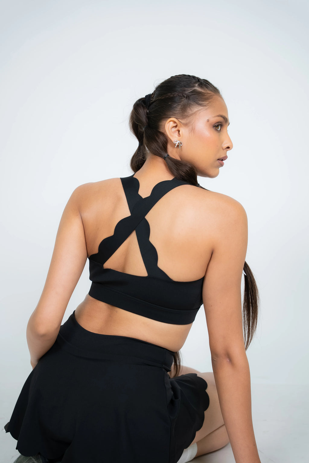 Black open back scallop sports bra for activewear