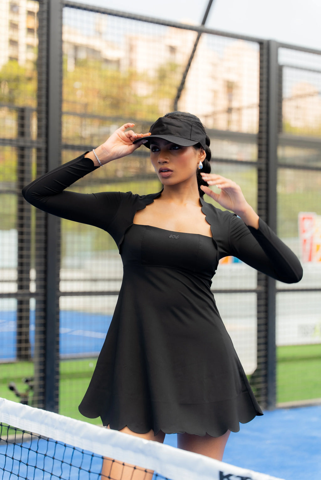 Black full sleeve sports dress for women with sculpt fit design by Soi