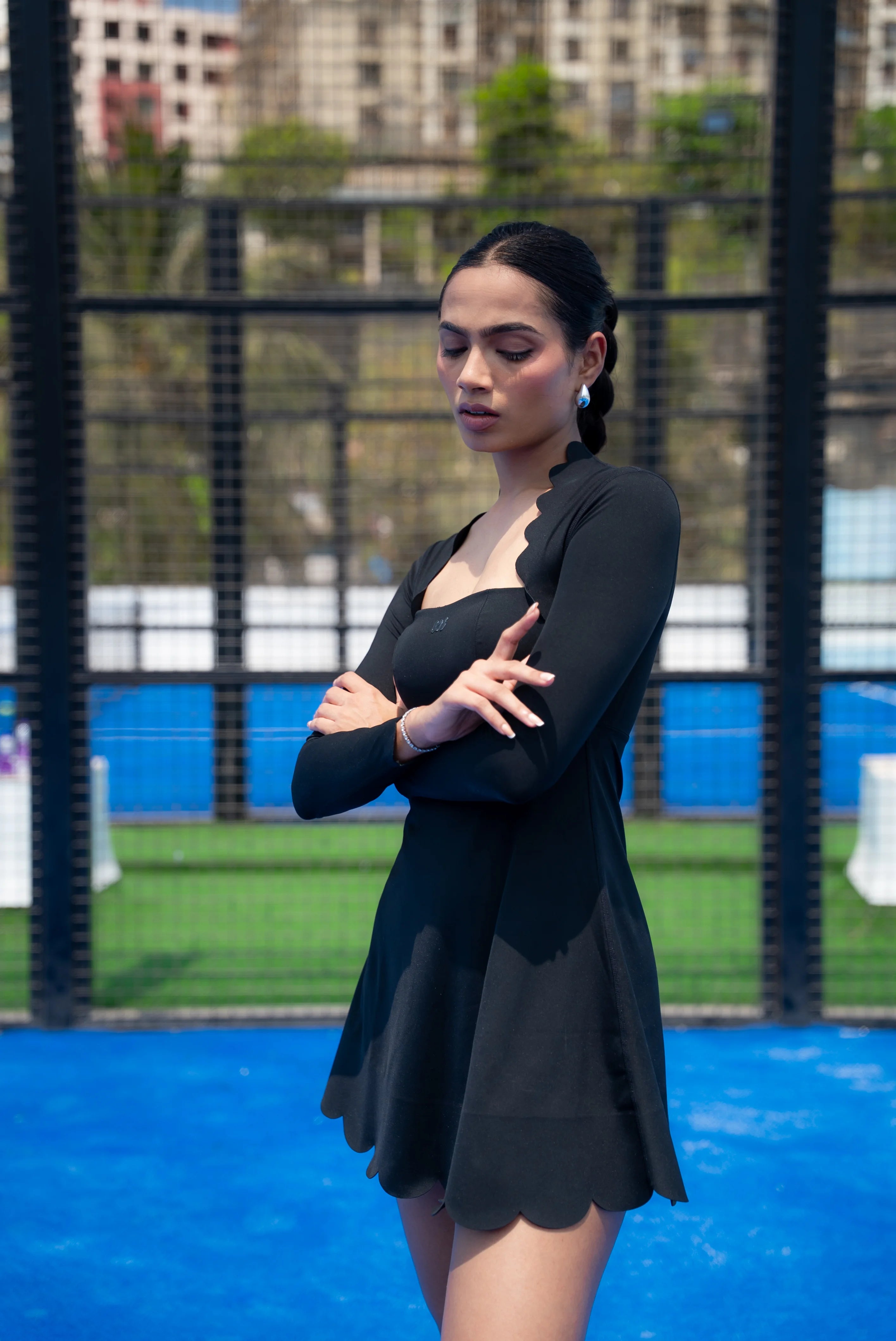 Black premium activewear dress for women styled for tennis and workouts by Soi