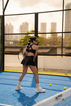 Black sporty flared skirt for tennis and athleisure styling
